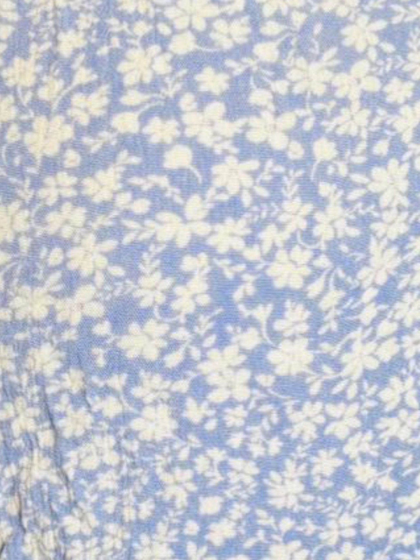 Light blue flower button top