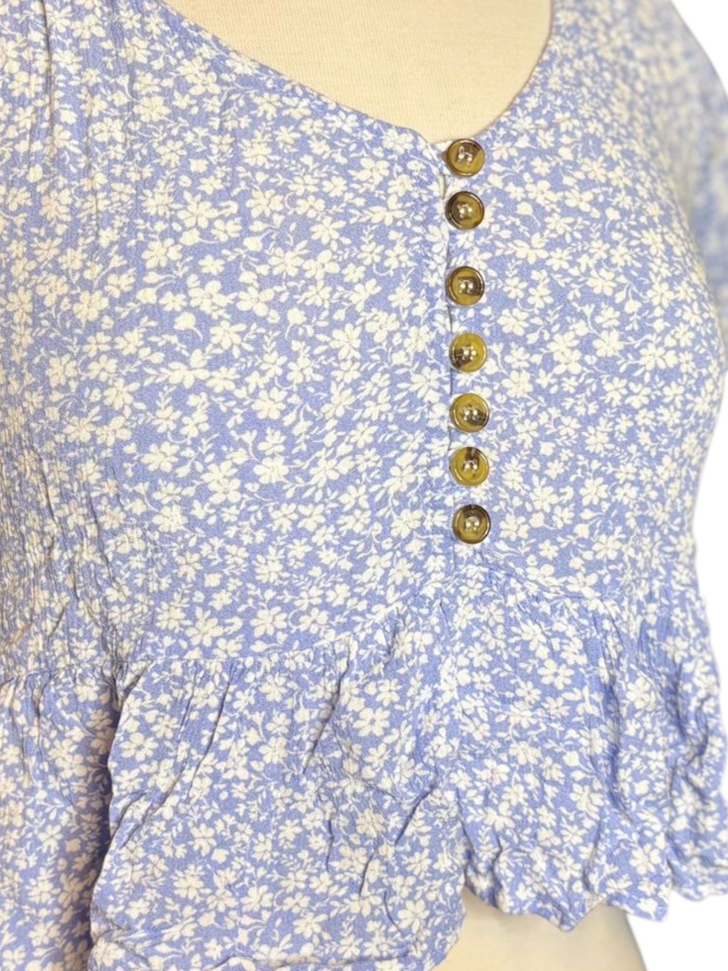 Light blue flower button top