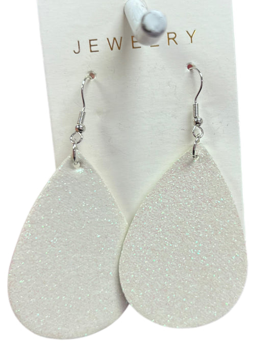 White earrings sparkle