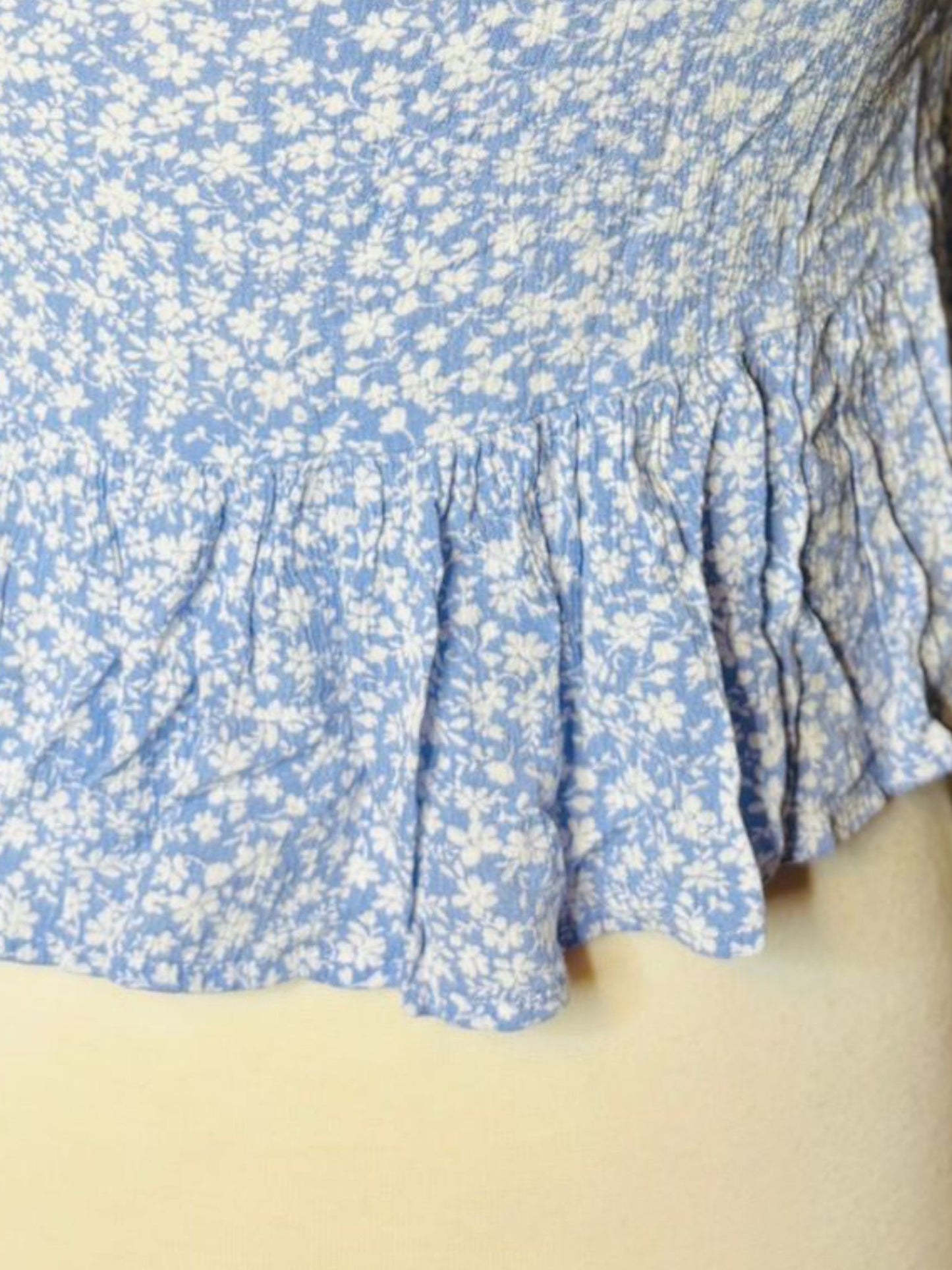 Light blue flower button top