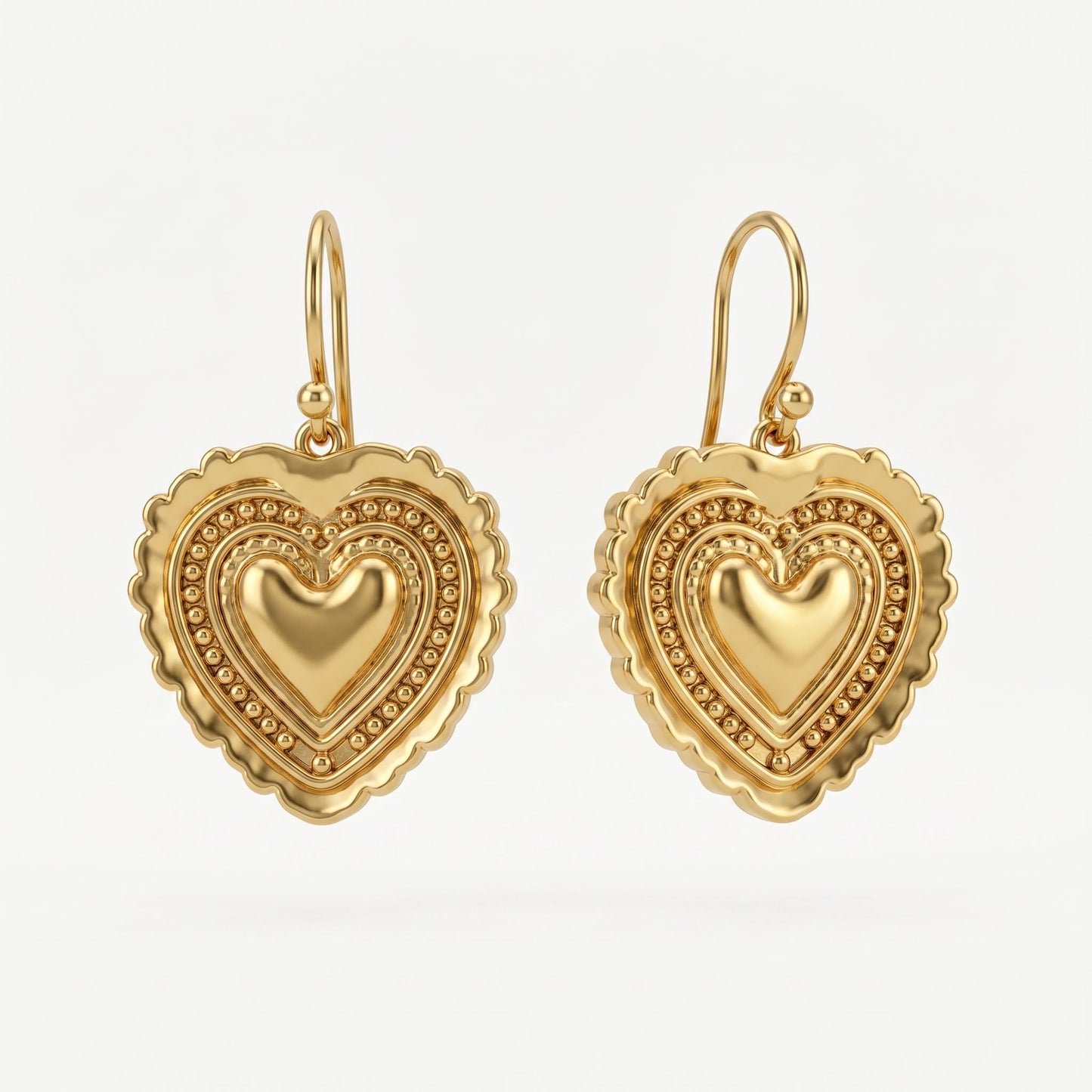 Heart Gold tone dangle earrings