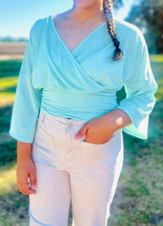 Teal wrapped top