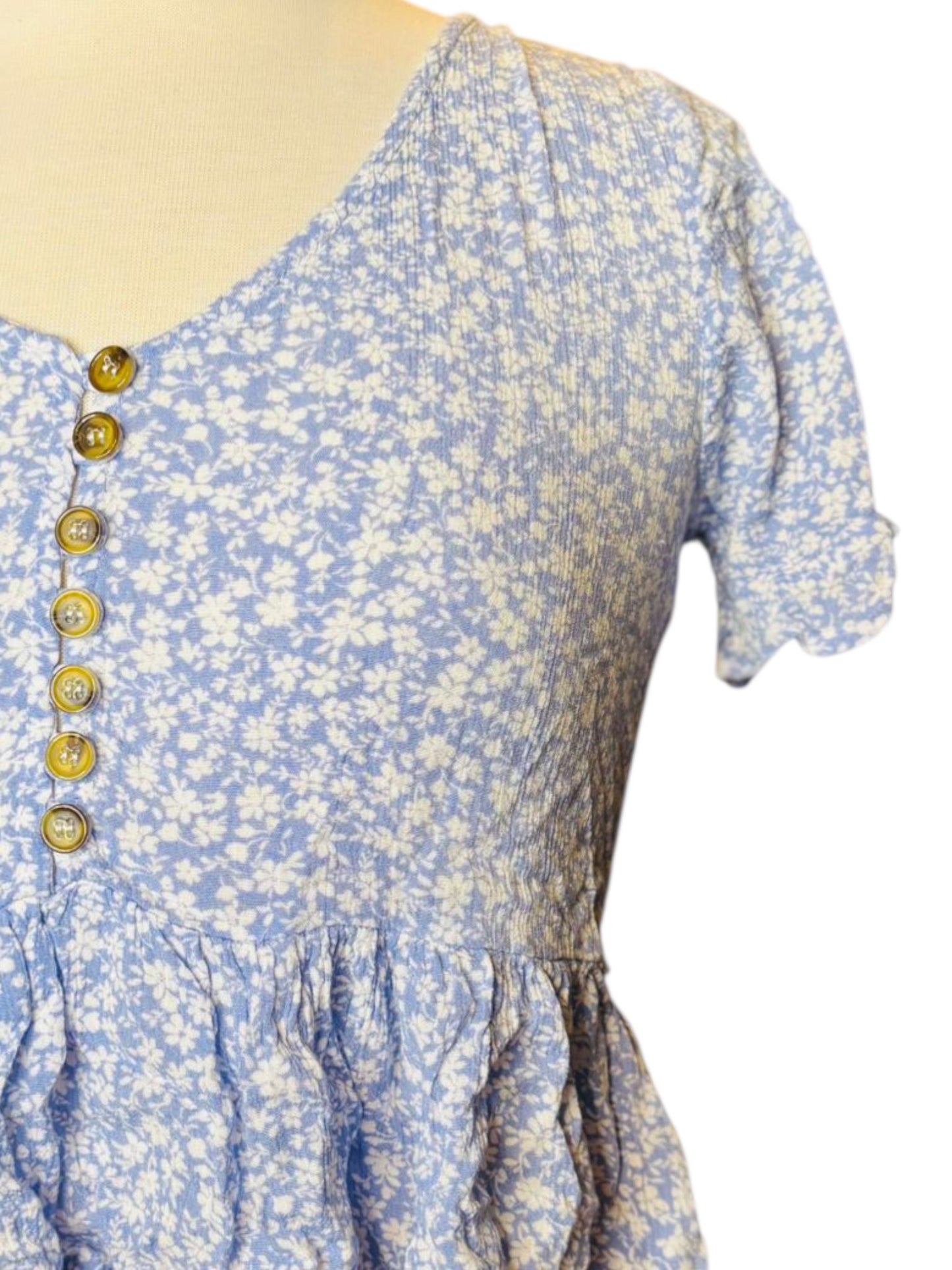 Light blue flower button top