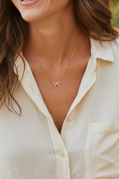 Bow necklace gold tone