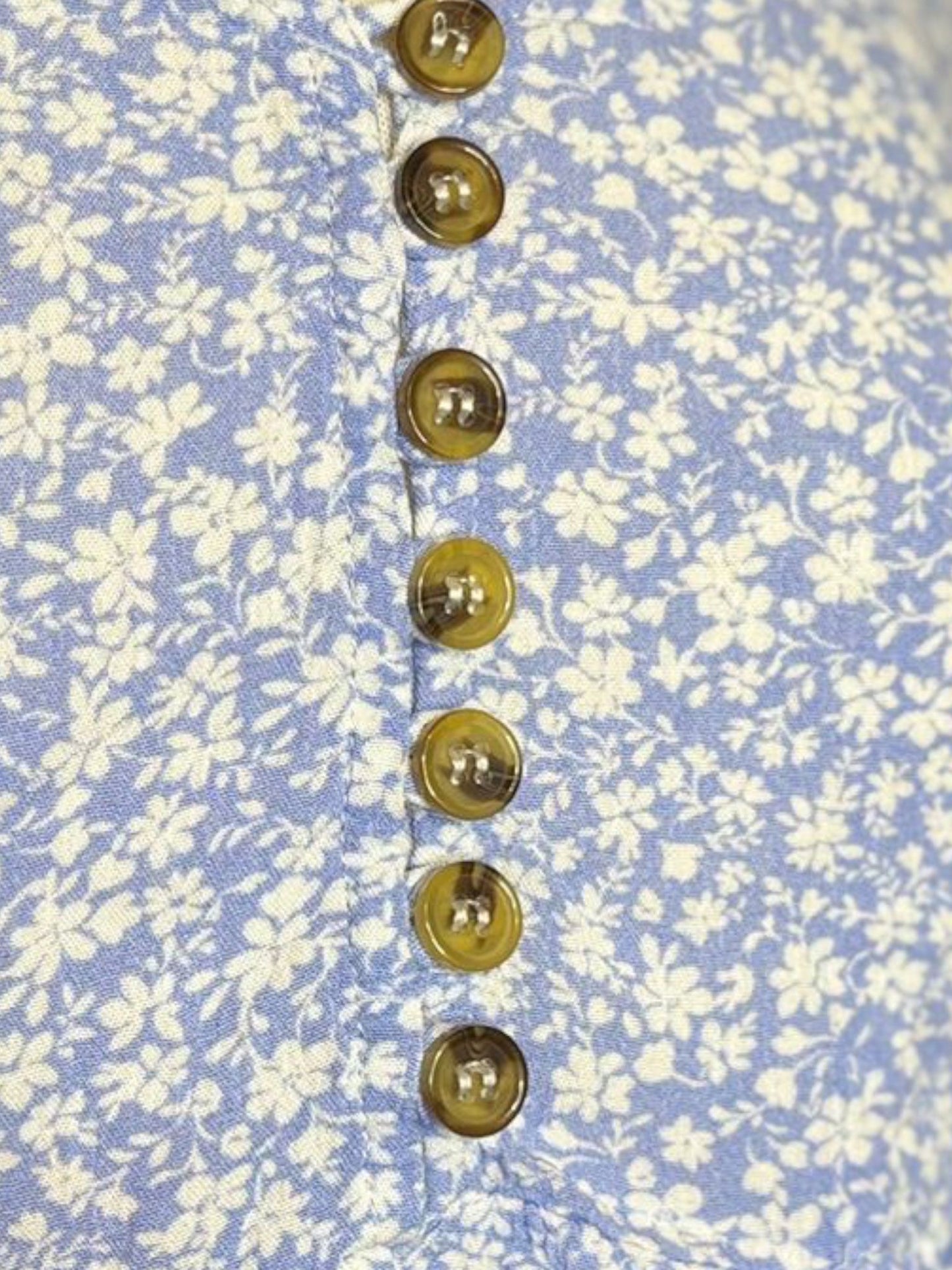 Light blue flower button top