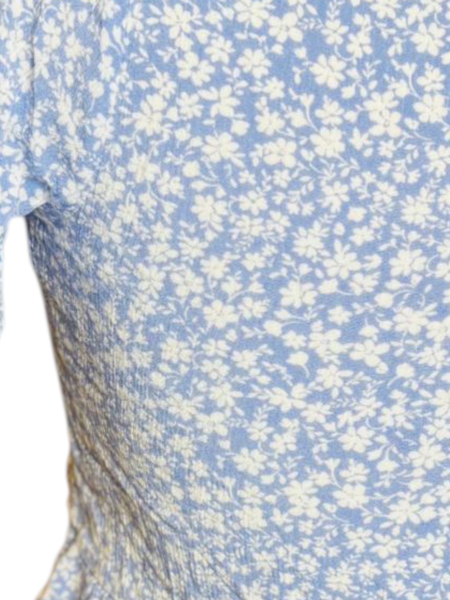 Light blue flower button top