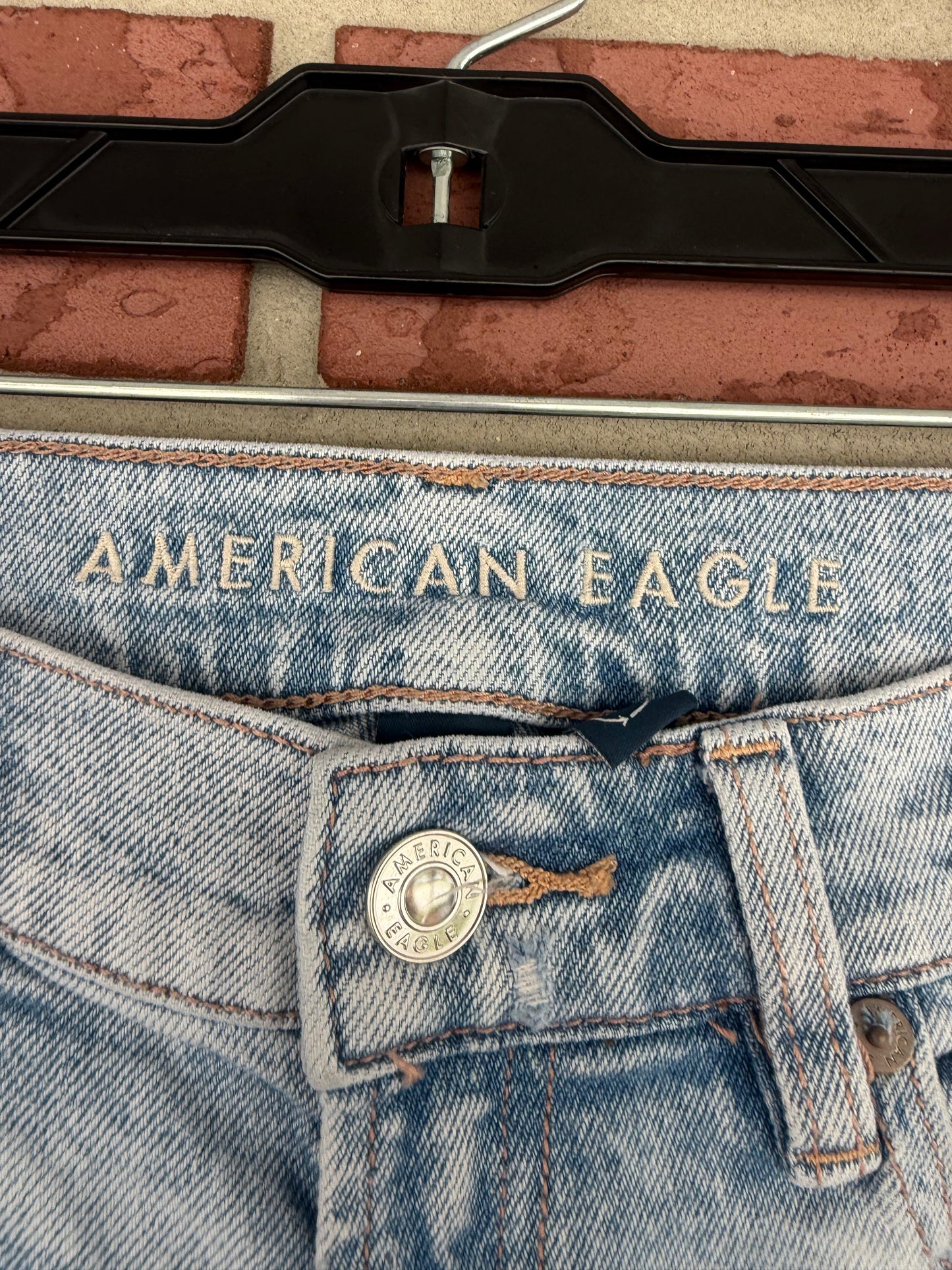American Eagle light washed ripped jeans