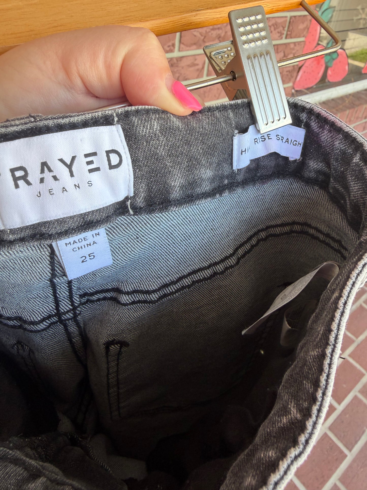 Frayed black denim jeans