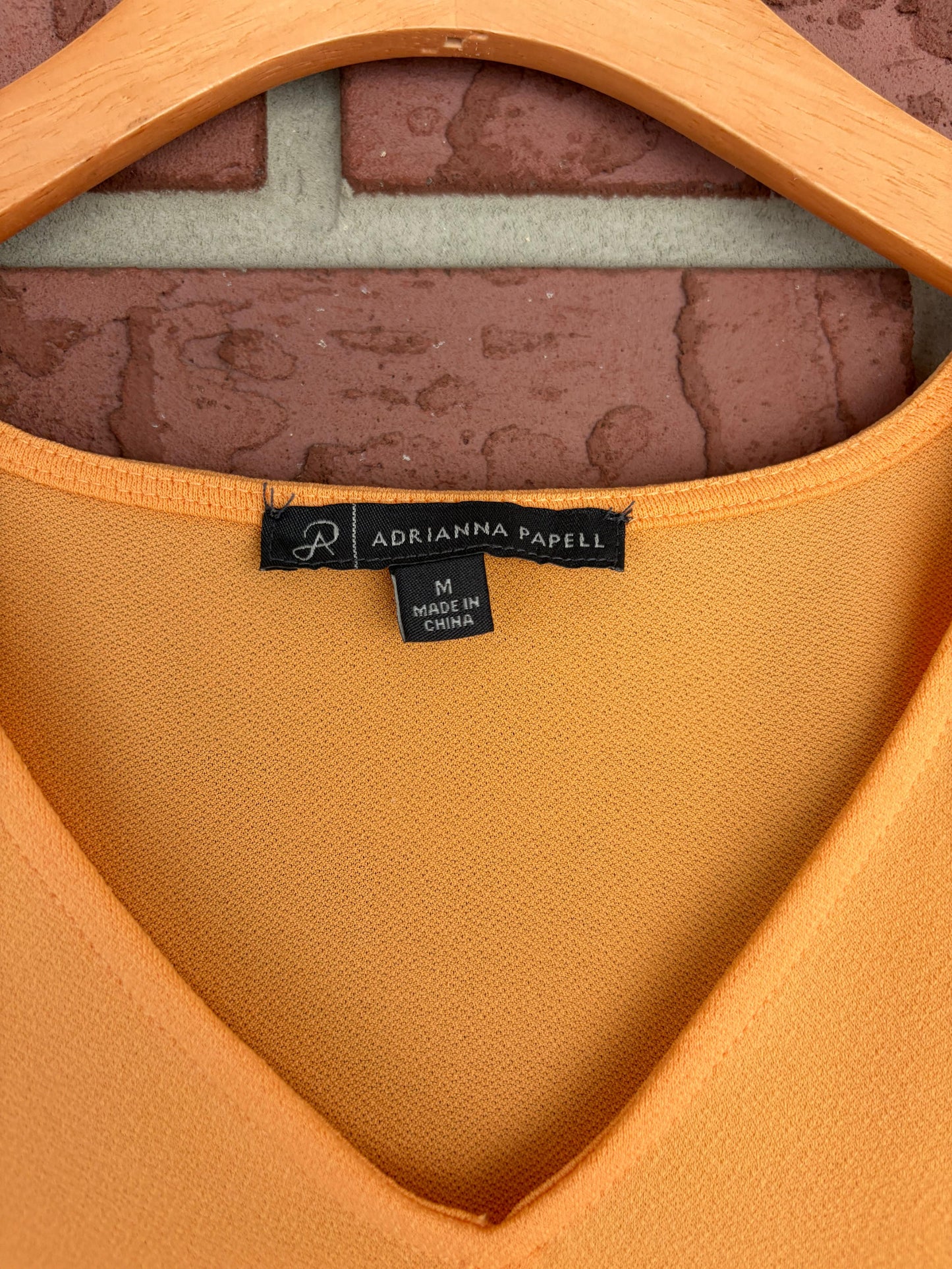 Adriana Papell orange cream ruffle sleeve top