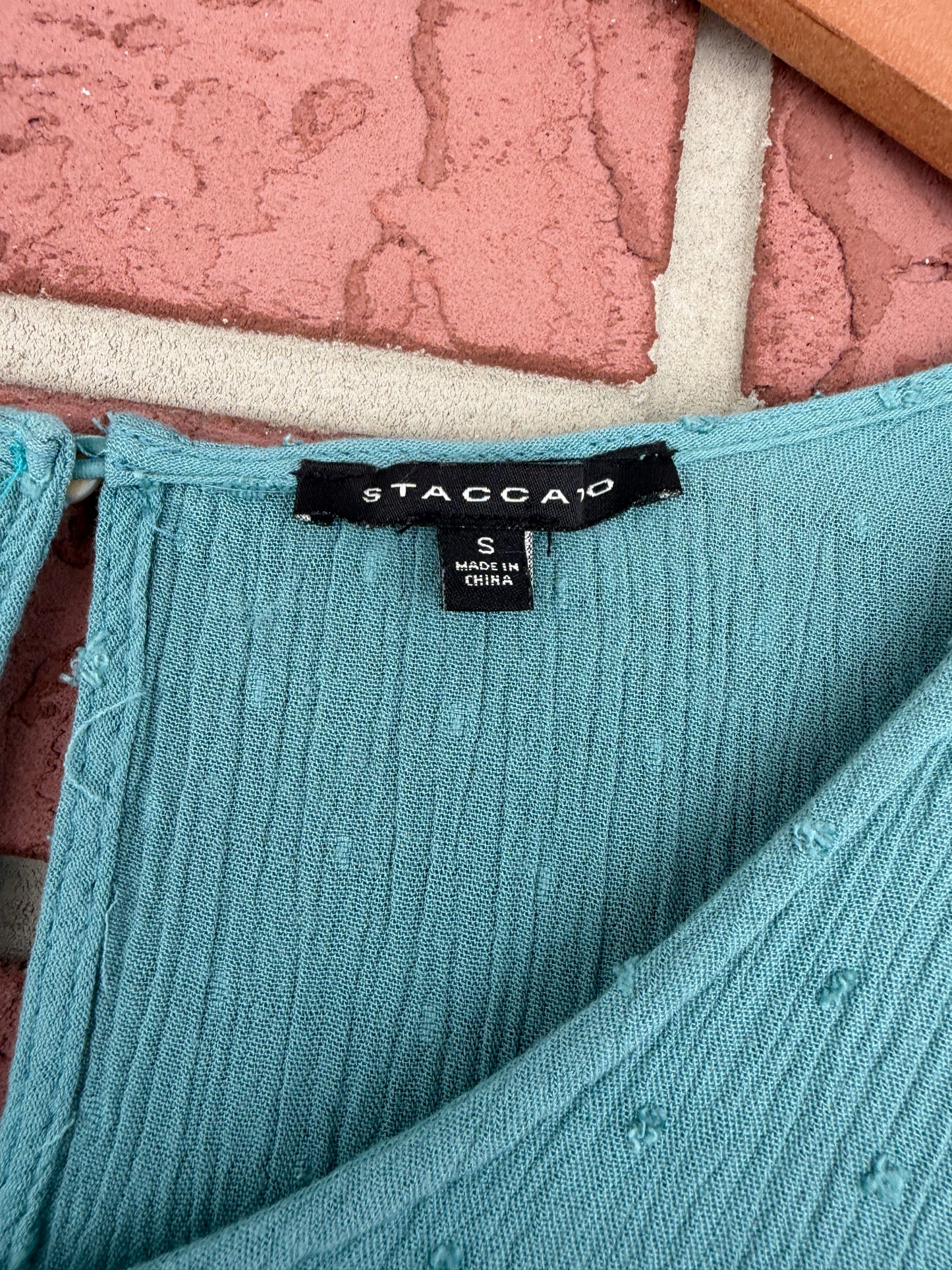 Staccato green top