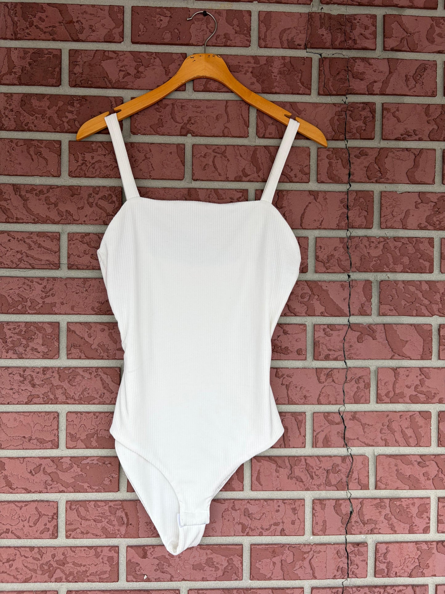 Pink lily white bodysuit