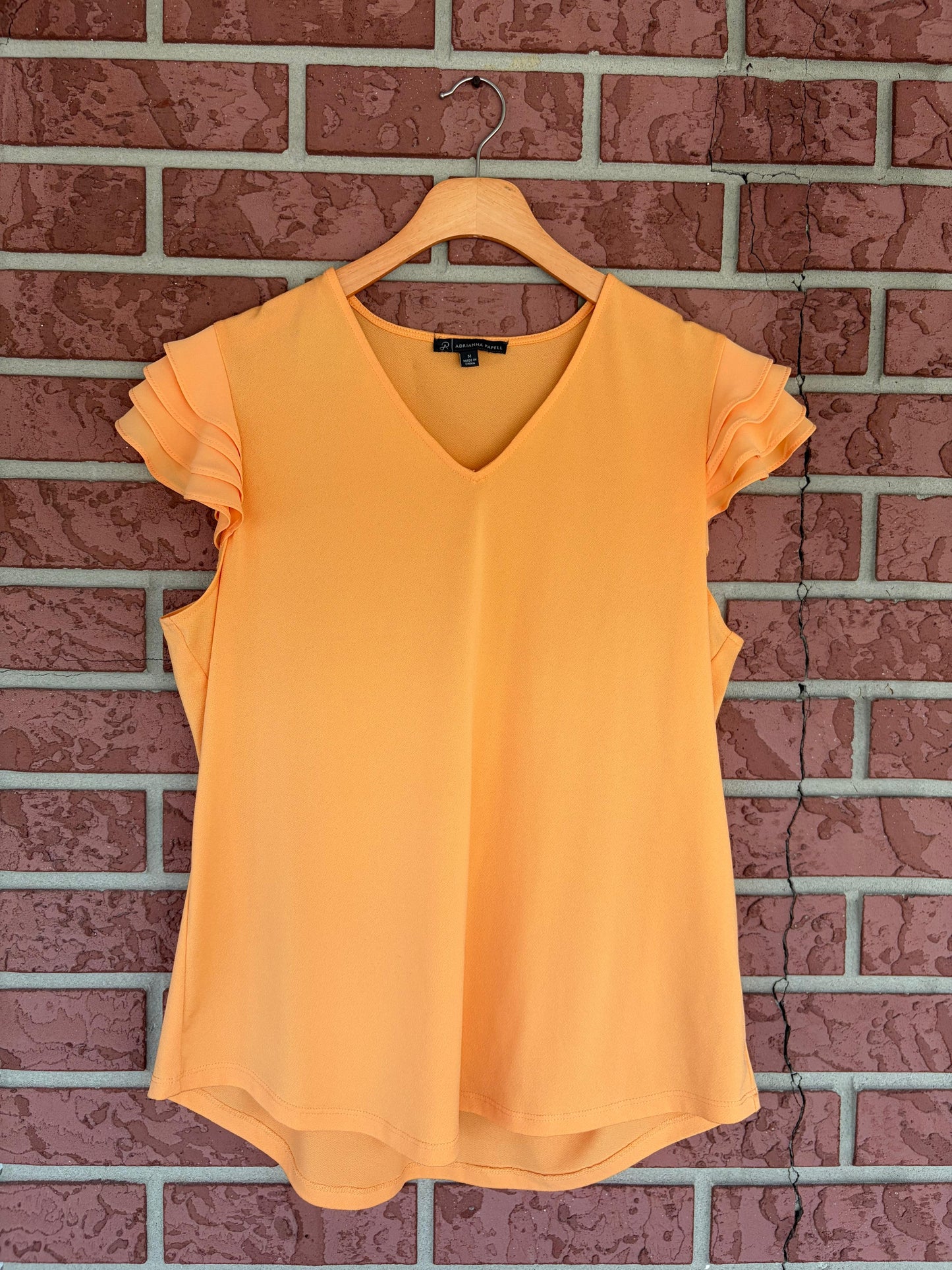Adriana Papell orange cream ruffle sleeve top