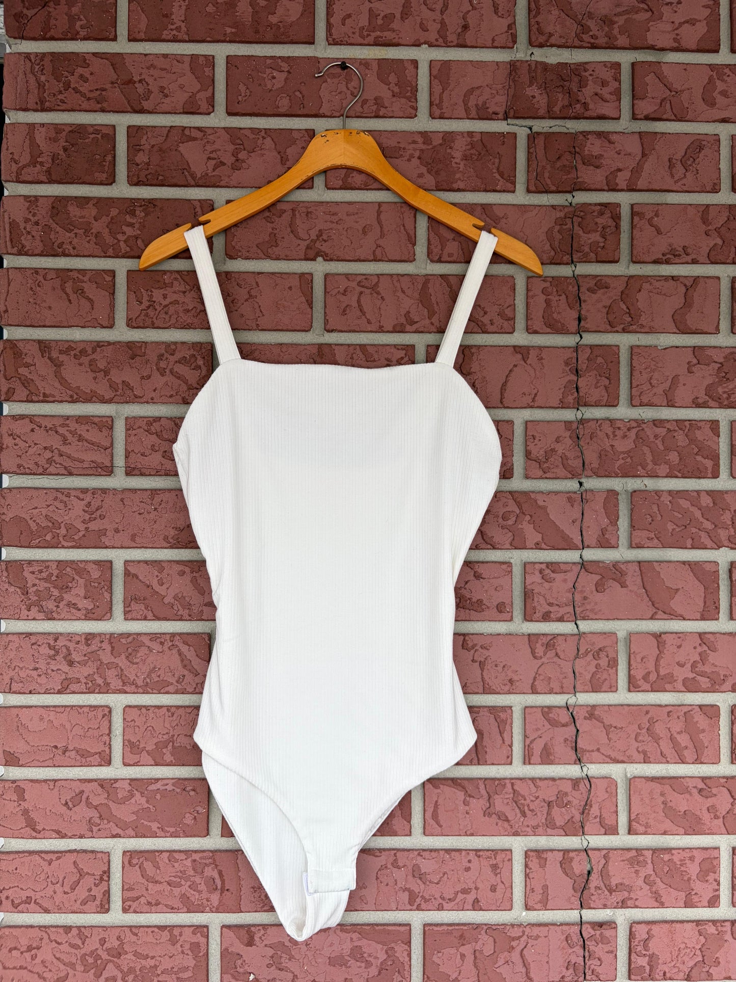 Pink lily white bodysuit