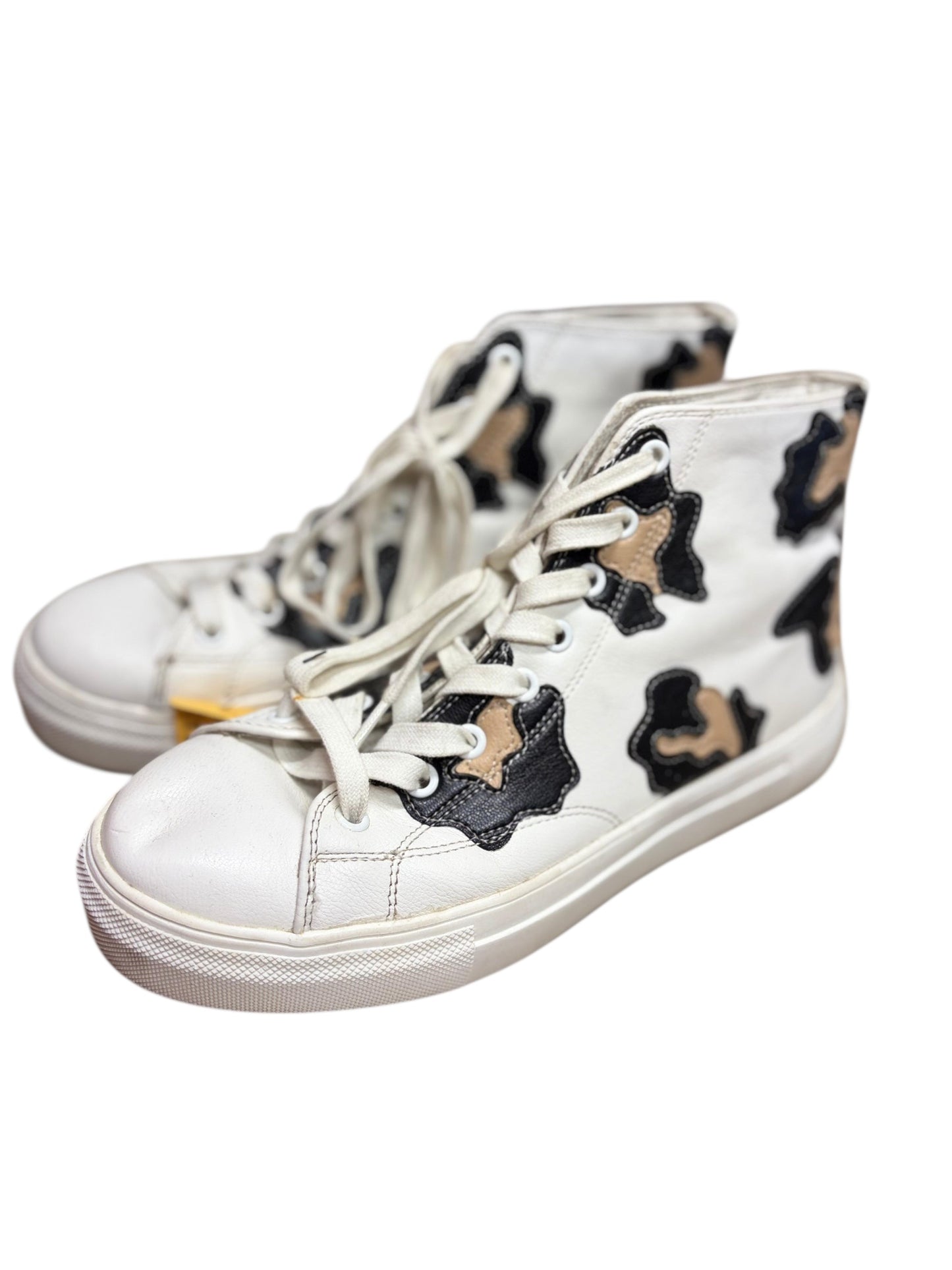 Hightop white and cheetah print shoe