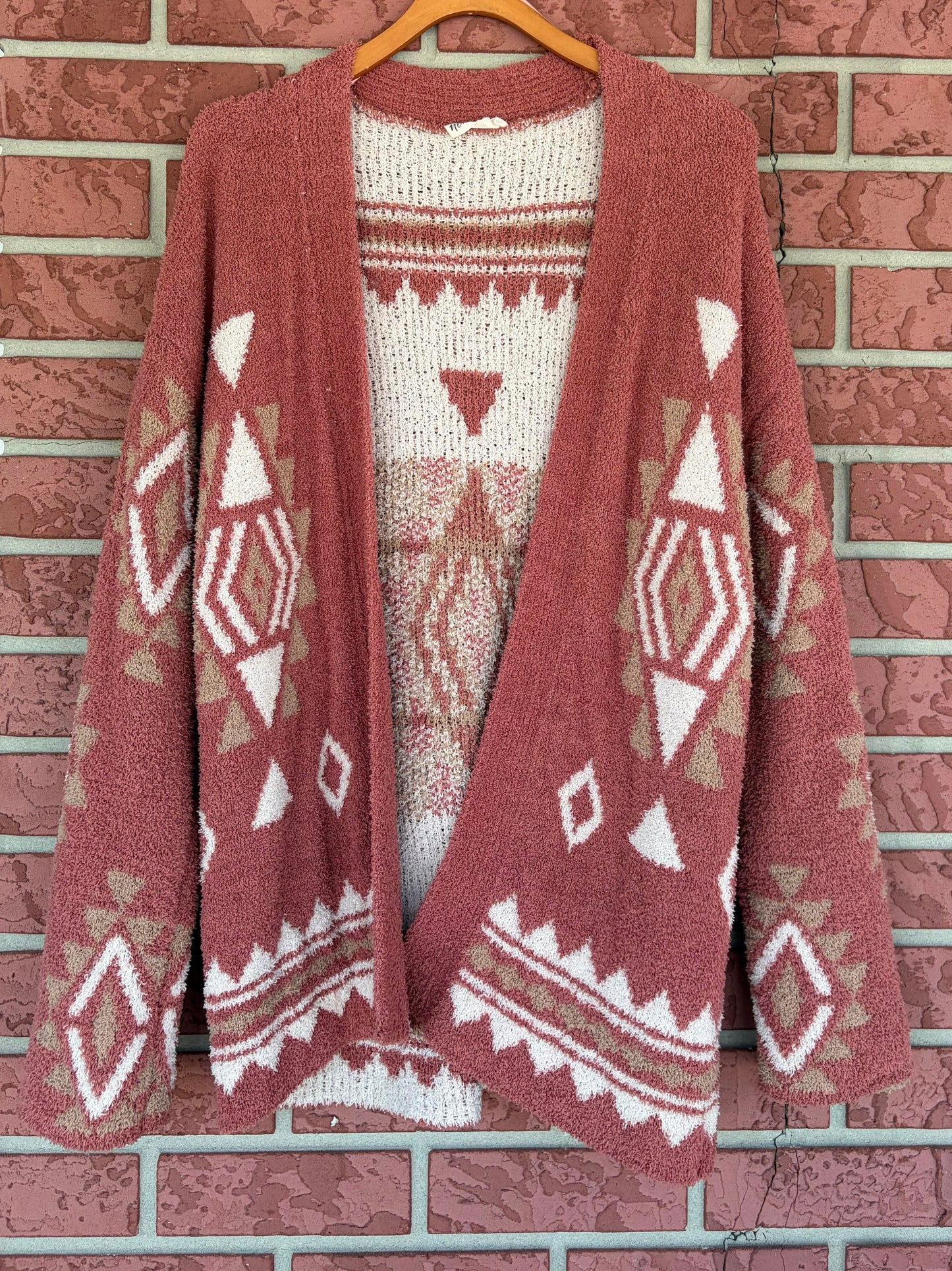 New in tribal sweater