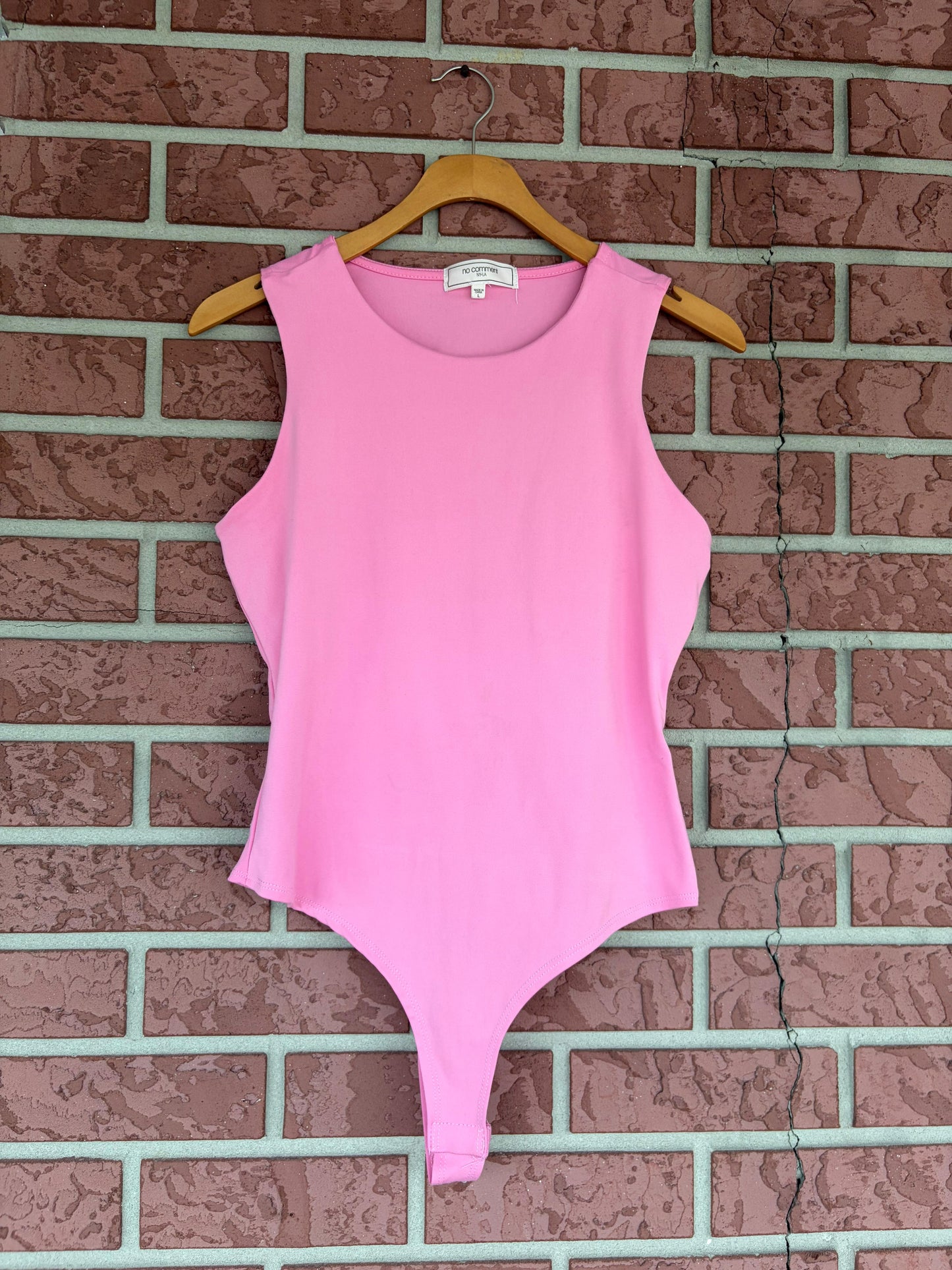 no comment pink bodysuit