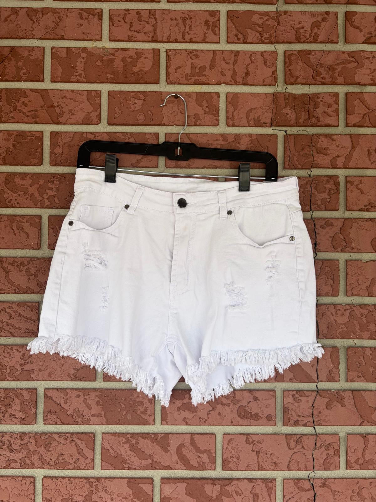 White fringe shorts
