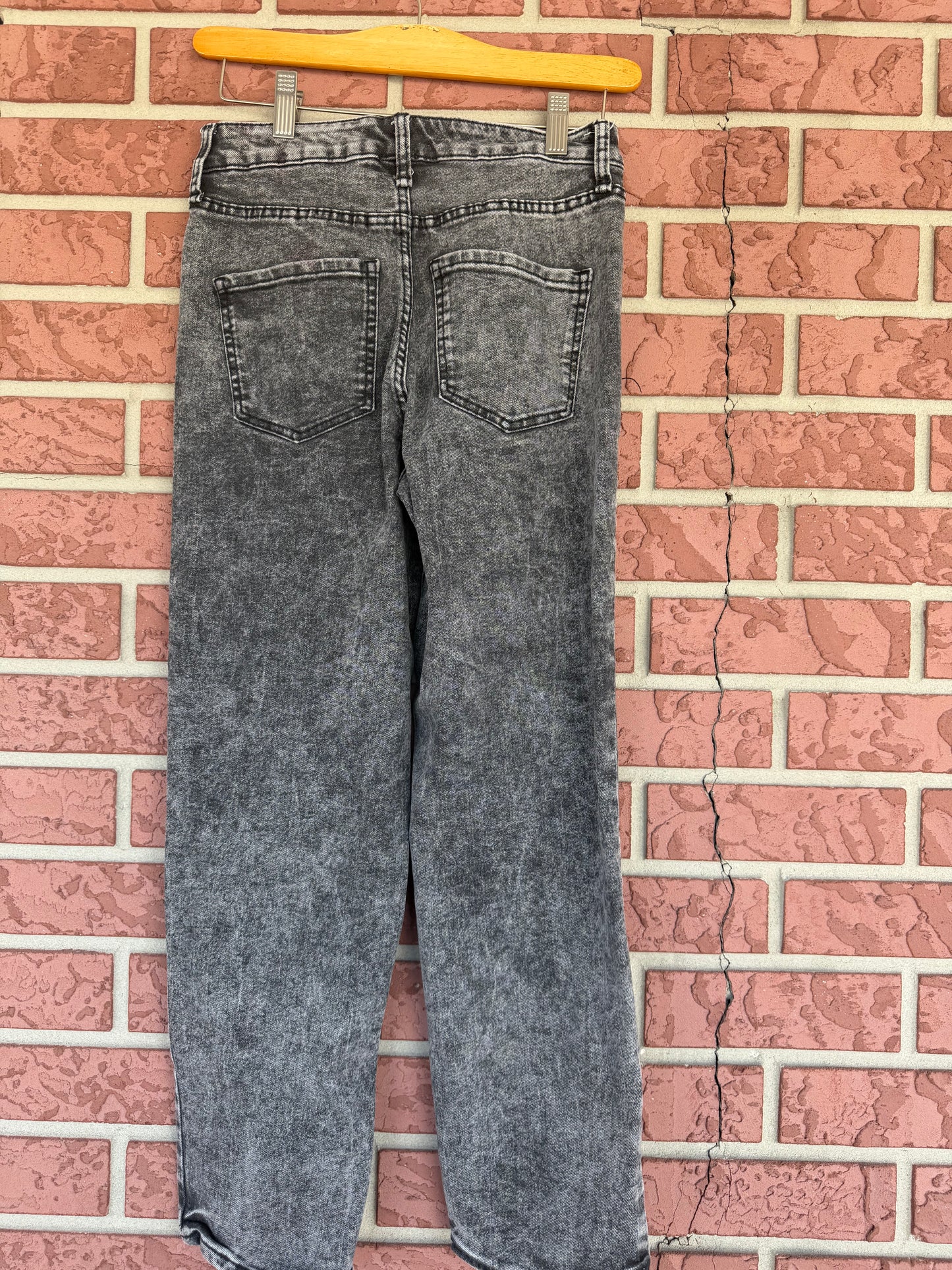 Frayed black denim jeans