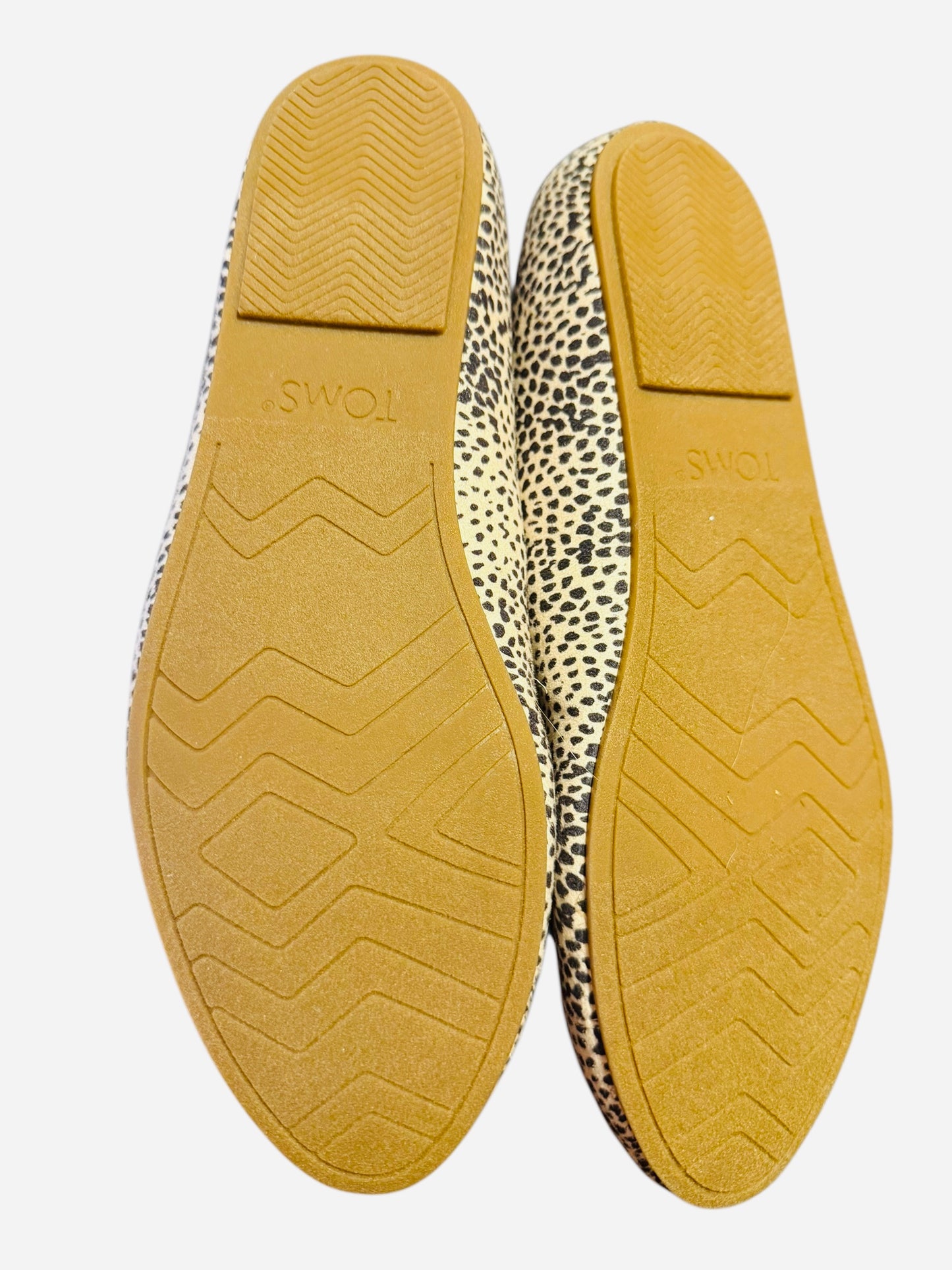 Tom’s Speckled print slip ons