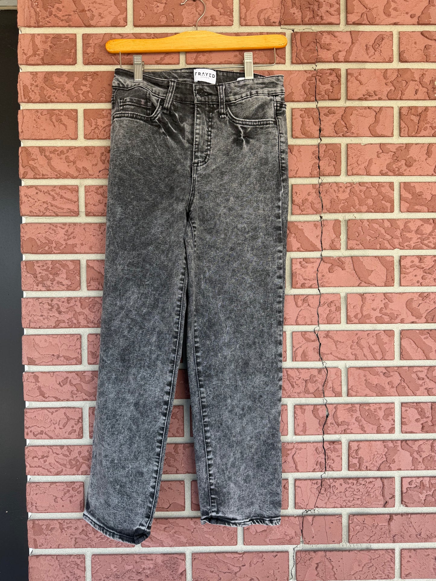 Frayed black denim jeans