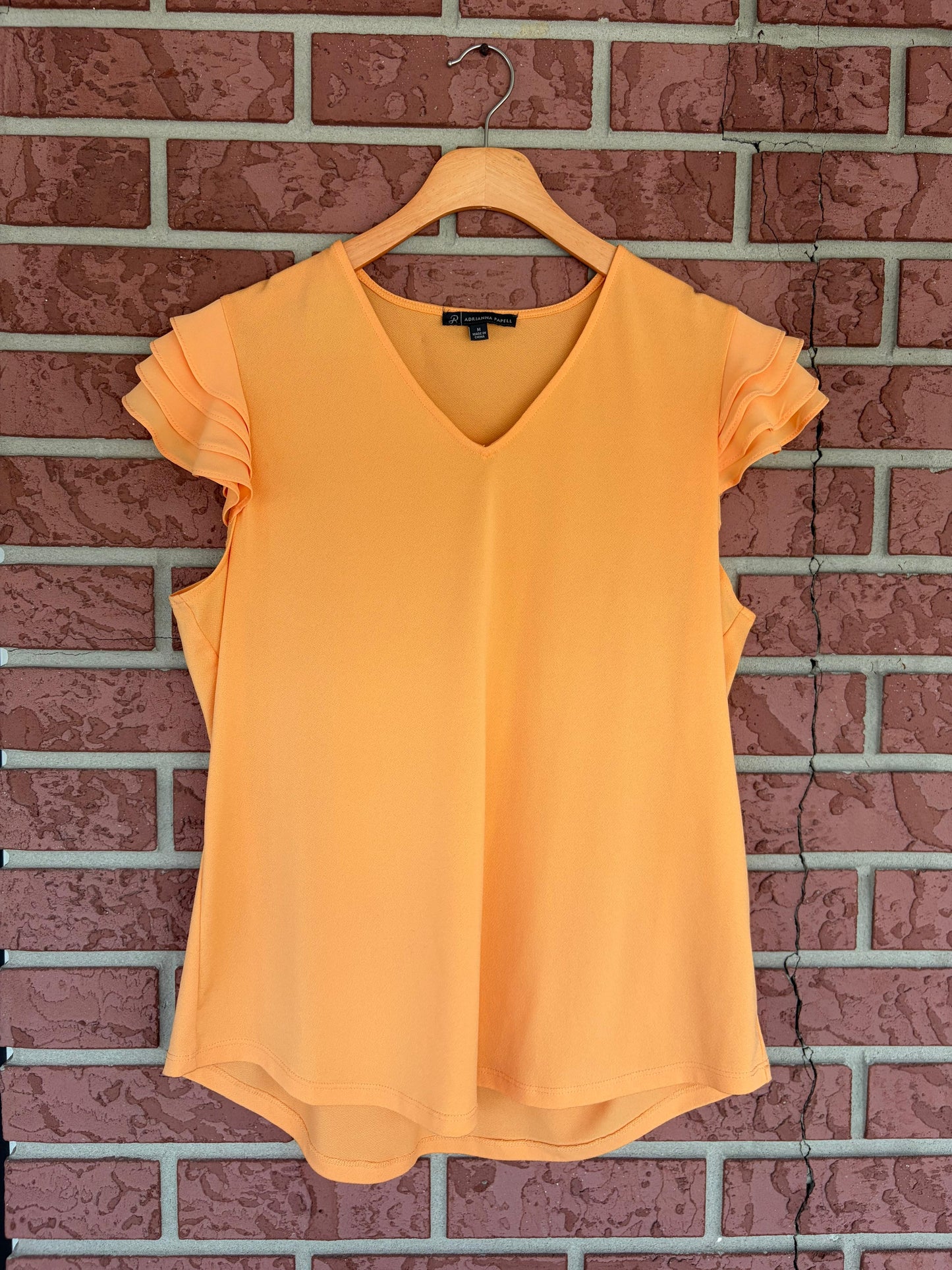 Adriana Papell orange cream ruffle sleeve top
