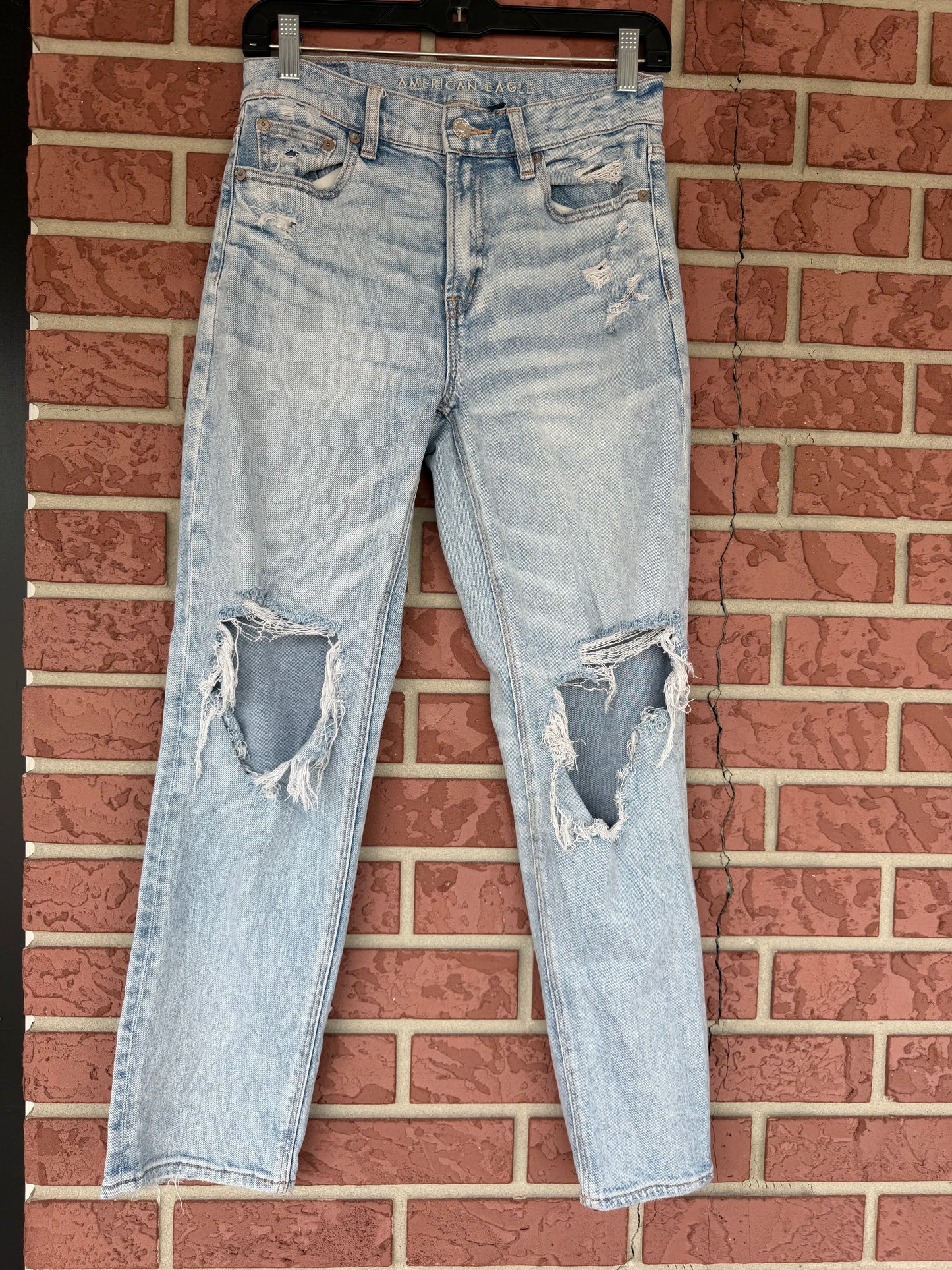 American Eagle light washed ripped jeans